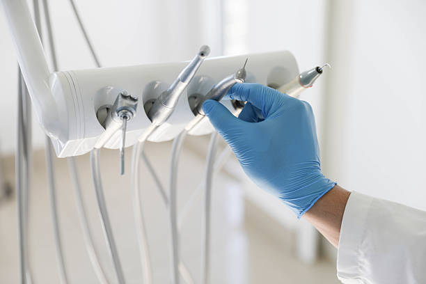 Professional Tooth Extraction technician working in Wyboo, SC